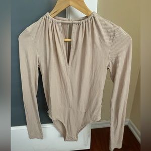 high neck light pink bodysuit